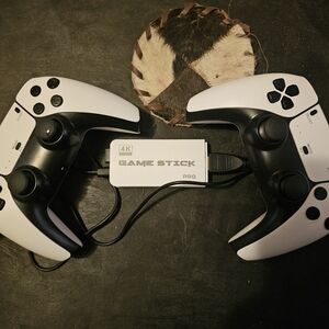 4K Game Stick Pro with Black and White Controllers